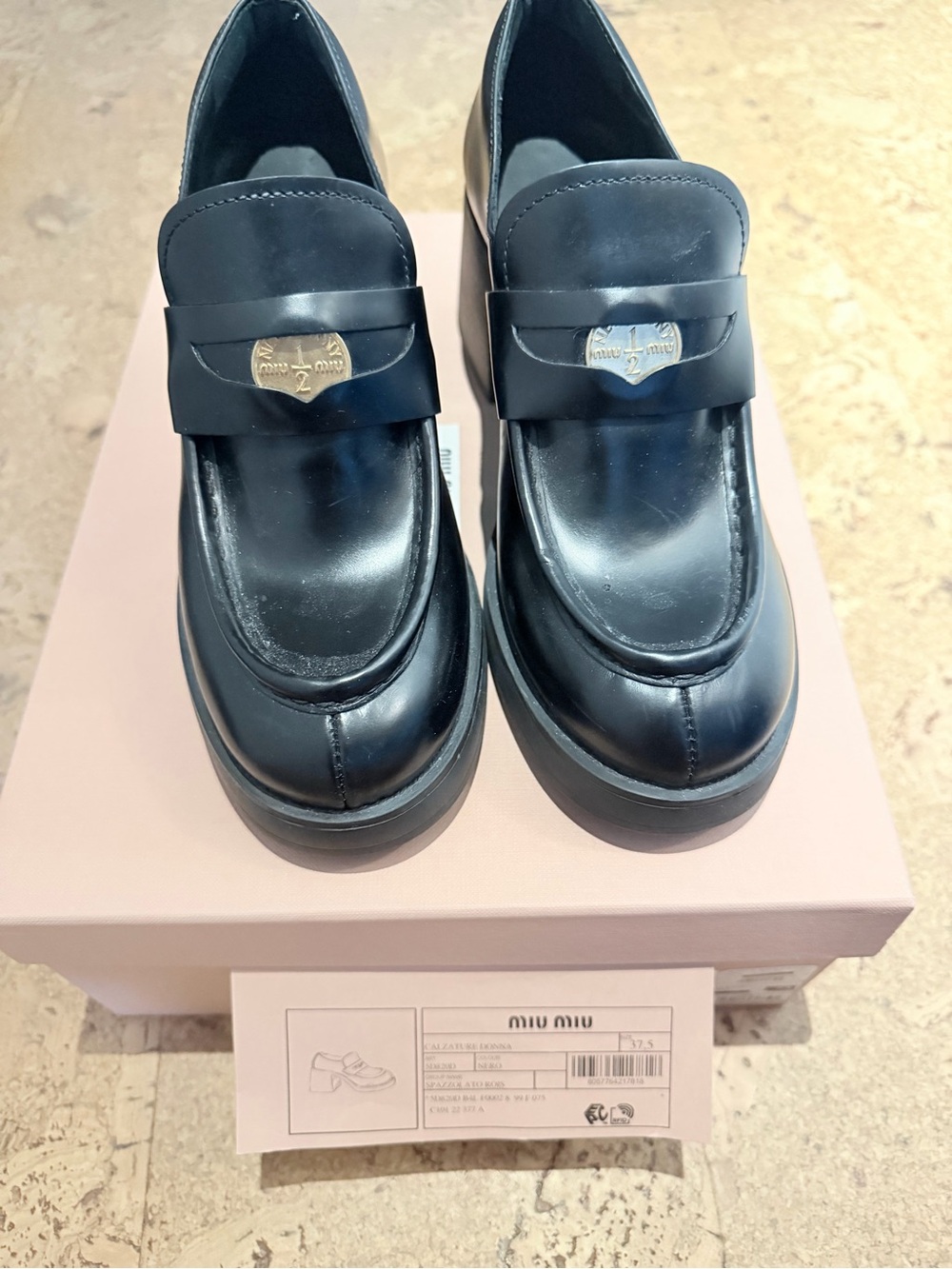 MIU MIU
Leather Penny Loafers